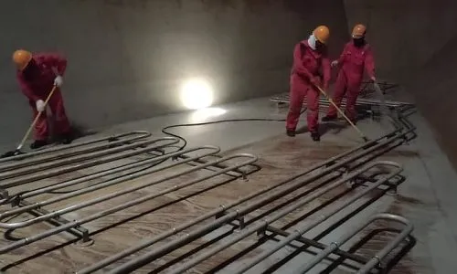 crew is cleaning cargo oil tank oil tanker