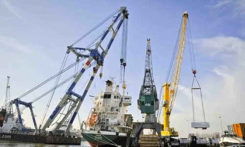 loading with floating crane and heavy lift crane at rhb stevedoring